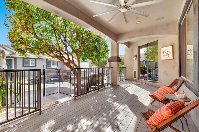 deck with visible vents and ceiling fan