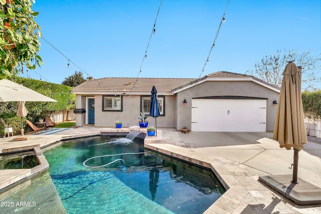 rear view of house with a fenced in pool, stucco siding, fence, a garage, and a tiled roof