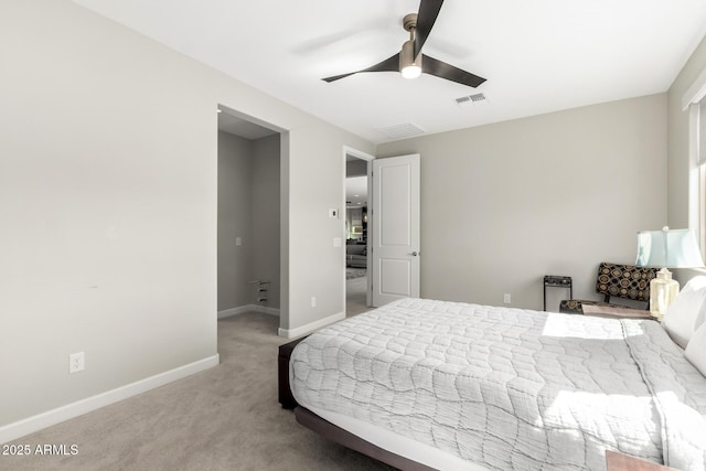 bedroom with ceiling fan, carpet, visible vents, and baseboards