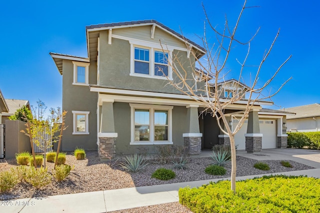 craftsman-style house featuring stone siding, concrete driveway, and stucco siding