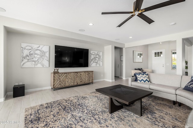 living room featuring ceiling fan, wood finish floors, recessed lighting, and baseboards