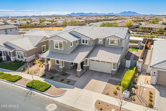 aerial view featuring a mountain view and a residential view