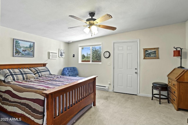 bedroom with light carpet, a baseboard radiator, an AC wall unit, and ceiling fan