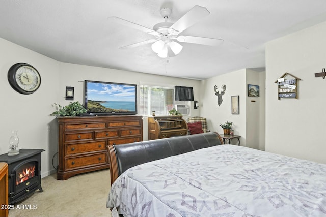 carpeted bedroom featuring a wood stove, ceiling fan, cooling unit, and a textured ceiling