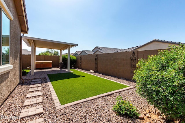 10307 E Tiburon Ave, Mesa, AZ 85212 - fenced backyard featuring a hot tub and a patio area