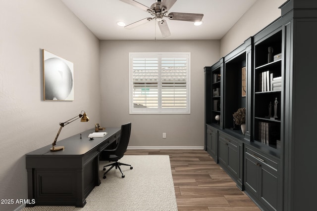 10307 E Tiburon Ave, Mesa, AZ 85212 - office space featuring a ceiling fan, wood finished floors, and baseboards