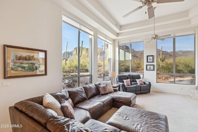 148 N La Barge Rd, Apache Junction, AZ 85119 - carpeted living area with a mountain view, ceiling fan, and healthy amount of natural light