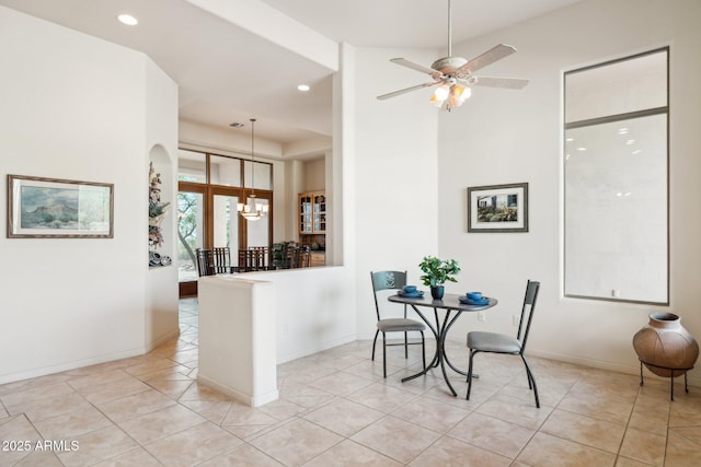 148 N La Barge Rd, Apache Junction, AZ 85119 - dining room with a chandelier, light tile patterned floors, recessed lighting, and a ceiling fan