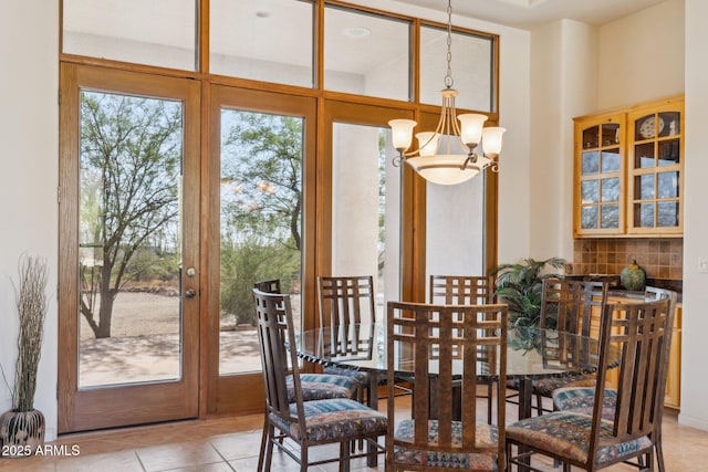 148 N La Barge Rd, Apache Junction, AZ 85119 - dining area with a chandelier and light tile patterned floors