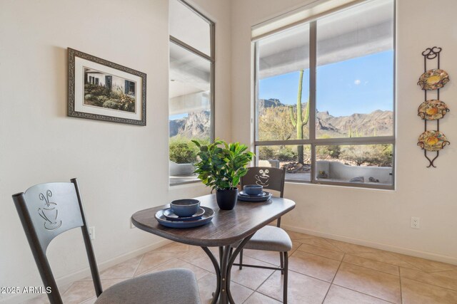 148 N La Barge Rd, Apache Junction, AZ 85119 - dining room with a mountain view and light tile patterned flooring