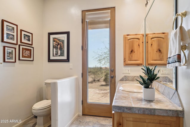 148 N La Barge Rd, Apache Junction, AZ 85119 - bathroom featuring toilet and vanity