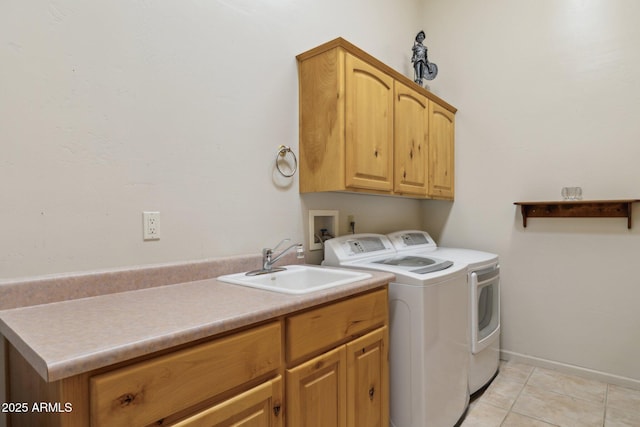 148 N La Barge Rd, Apache Junction, AZ 85119 - laundry area featuring cabinet space, washing machine and clothes dryer, and light tile patterned flooring