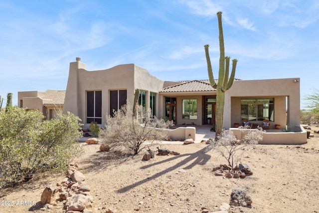 148 N La Barge Rd, Apache Junction, AZ 85119 - back of house featuring stucco siding and a tile roof