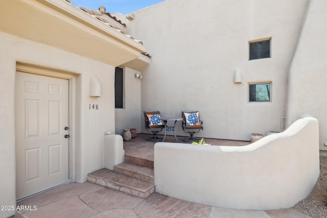 148 N La Barge Rd, Apache Junction, AZ 85119 - doorway to property featuring stucco siding