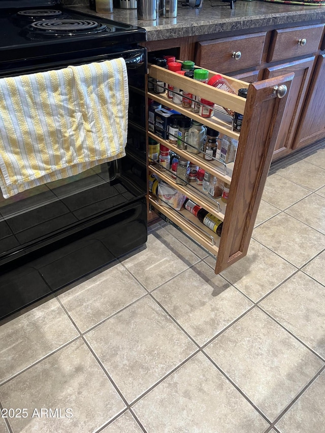 interior details with black electric range