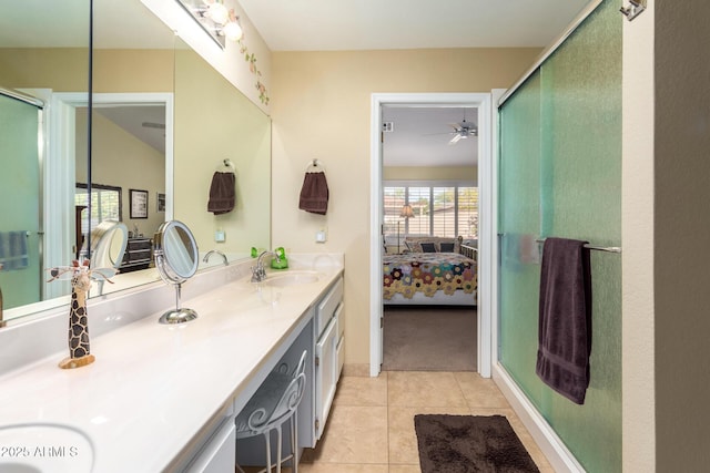 bathroom featuring vanity, tile patterned floors, ceiling fan, and a shower with shower door