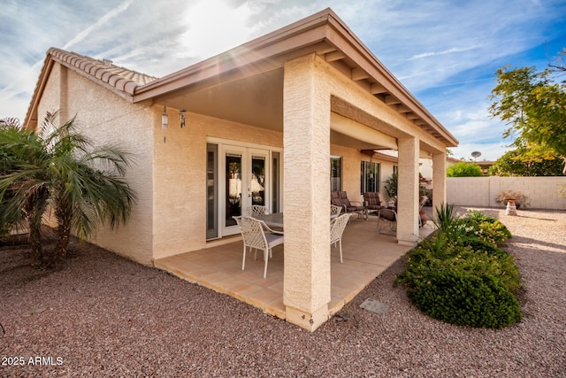 view of patio featuring french doors