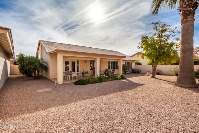 back of house featuring a patio area