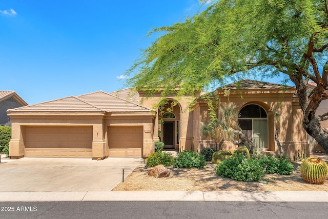 11324 E Diamond Cholla Dr, Scottsdale, AZ 85255 - view of front of property with an attached garage, stucco siding, driveway, and a tile roof