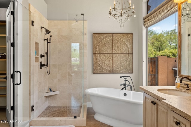 11324 E Diamond Cholla Dr, Scottsdale, AZ 85255 - full bath featuring a stall shower, a freestanding tub, vanity, and a walk in closet
