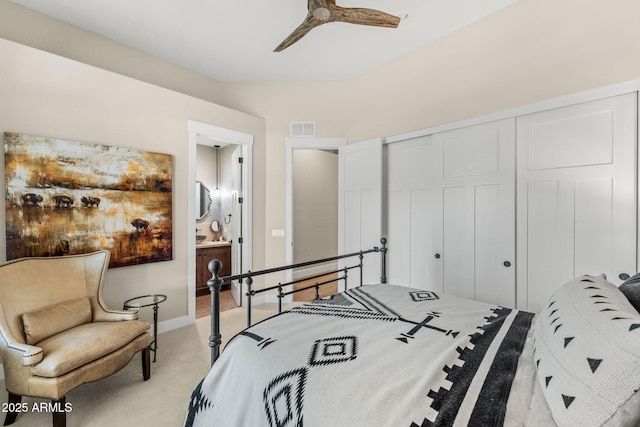 11324 E Diamond Cholla Dr, Scottsdale, AZ 85255 - bedroom featuring light carpet, a closet, connected bathroom, baseboards, and a ceiling fan