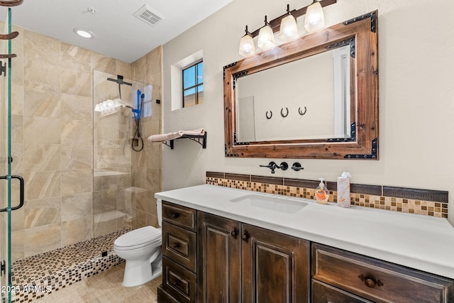 11324 E Diamond Cholla Dr, Scottsdale, AZ 85255 - bathroom with vanity, toilet, a stall shower, decorative backsplash, and recessed lighting