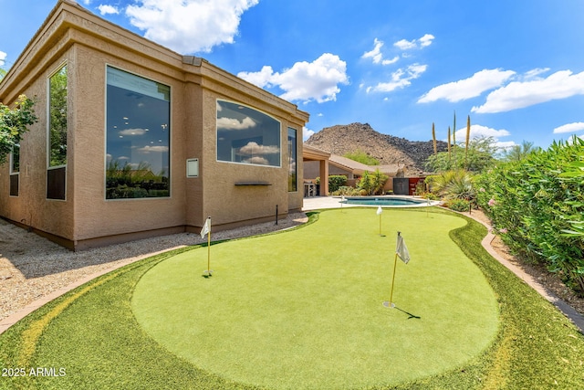 11324 E Diamond Cholla Dr, Scottsdale, AZ 85255 - view of community featuring a putting area and a mountain view