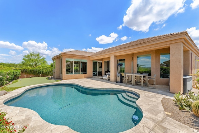 11324 E Diamond Cholla Dr, Scottsdale, AZ 85255 - swimming pool featuring a putting area and a patio area