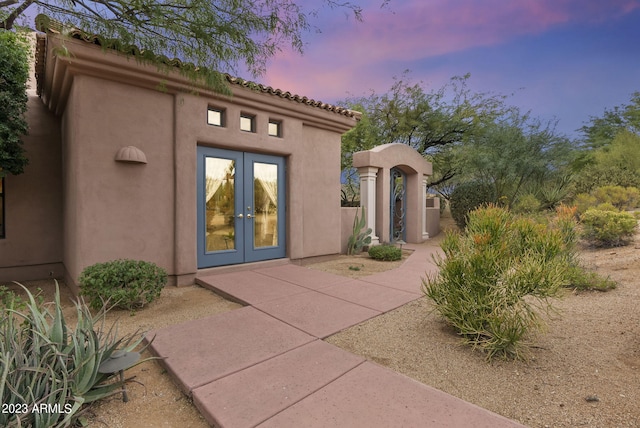 exterior space with a patio and french doors