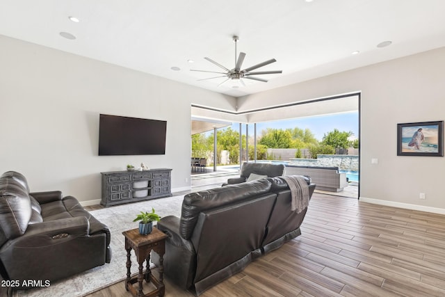 2630 E Lovebird Ln, Gilbert, AZ 85297 - living room with a ceiling fan, wood finished floors, and recessed lighting