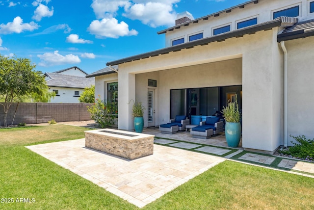 2630 E Lovebird Ln, Gilbert, AZ 85297 - back of house with a patio area, stucco siding, an outdoor living space with a fire pit, and a chimney