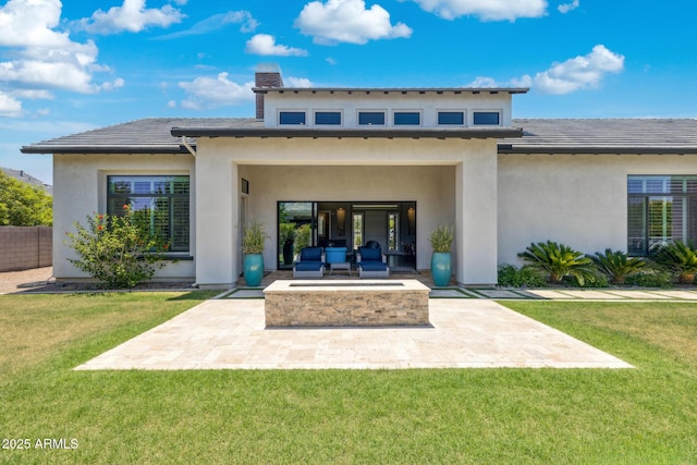 2630 E Lovebird Ln, Gilbert, AZ 85297 - rear view of property featuring an outdoor fire pit, a patio area, and a lawn