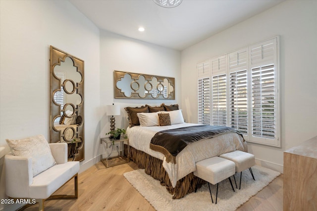 bedroom featuring light hardwood / wood-style flooring