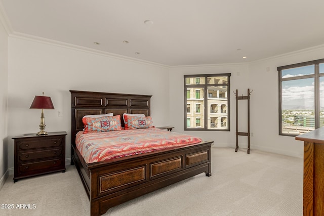 bedroom with light carpet, baseboards, and ornamental molding