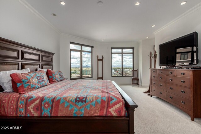 bedroom featuring ornamental molding, recessed lighting, and light carpet