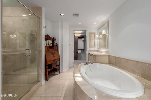 full bath with visible vents, a shower stall, a whirlpool tub, tile patterned floors, and vanity