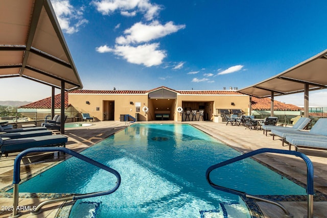 pool with a patio