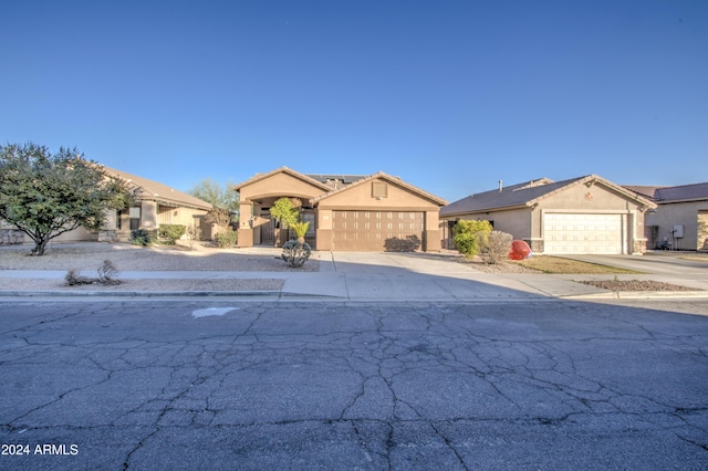 view of front of property with a garage