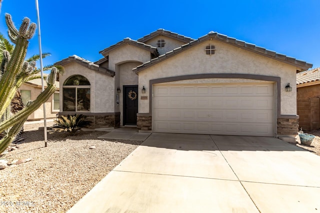 view of front of home with a garage