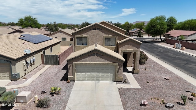 1758 E San Xavier Dr, Casa Grande, AZ 85122 - view of front of house with concrete driveway and stucco siding