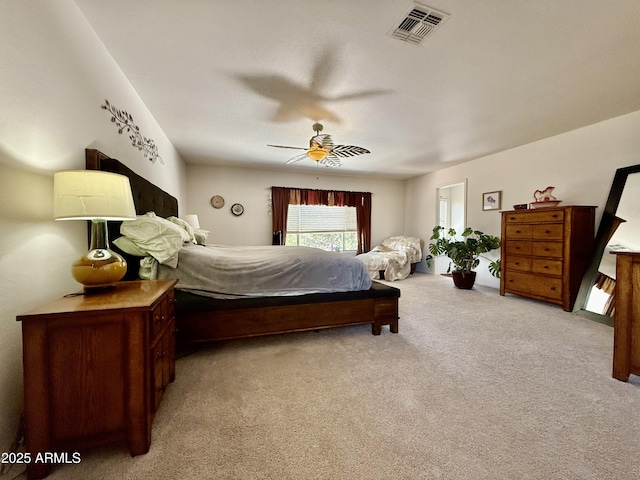 1758 E San Xavier Dr, Casa Grande, AZ 85122 - bedroom with light colored carpet and a ceiling fan
