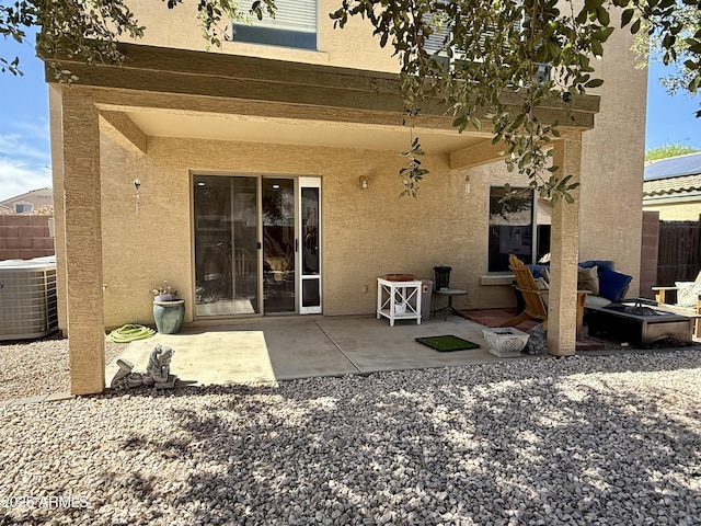 1758 E San Xavier Dr, Casa Grande, AZ 85122 - rear view of property with cooling unit, stucco siding, and a patio