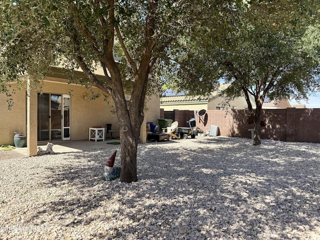 1758 E San Xavier Dr, Casa Grande, AZ 85122 - back of property featuring a patio and stucco siding