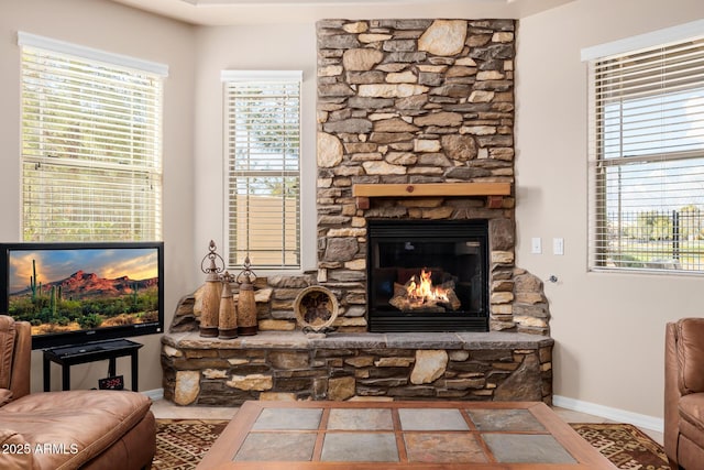 living room featuring a fireplace