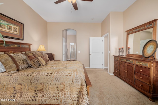 bedroom featuring light colored carpet and ceiling fan