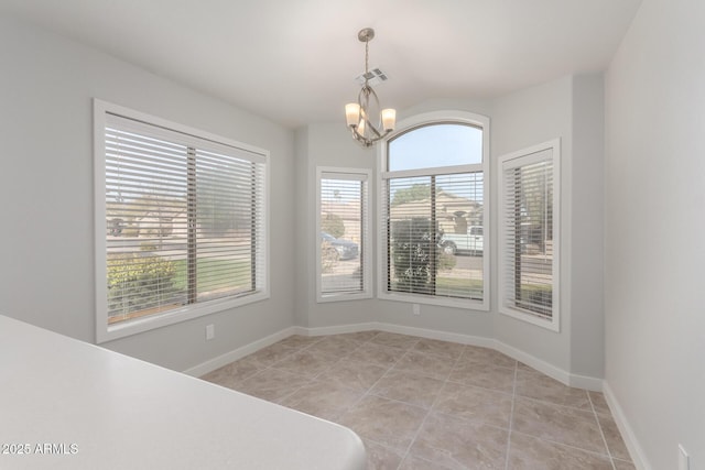 unfurnished dining area with vaulted ceiling, light tile patterned floors, and a notable chandelier