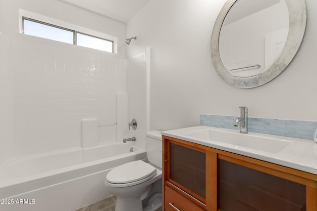 full bathroom featuring shower / bathing tub combination, tasteful backsplash, vanity, toilet, and tile patterned floors