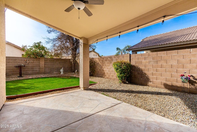 view of patio featuring ceiling fan