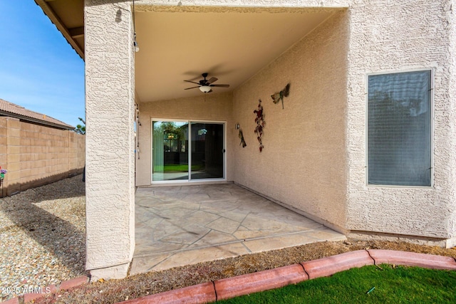 view of patio / terrace featuring ceiling fan