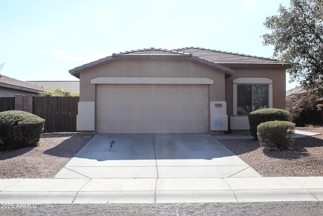 ranch-style house featuring a garage